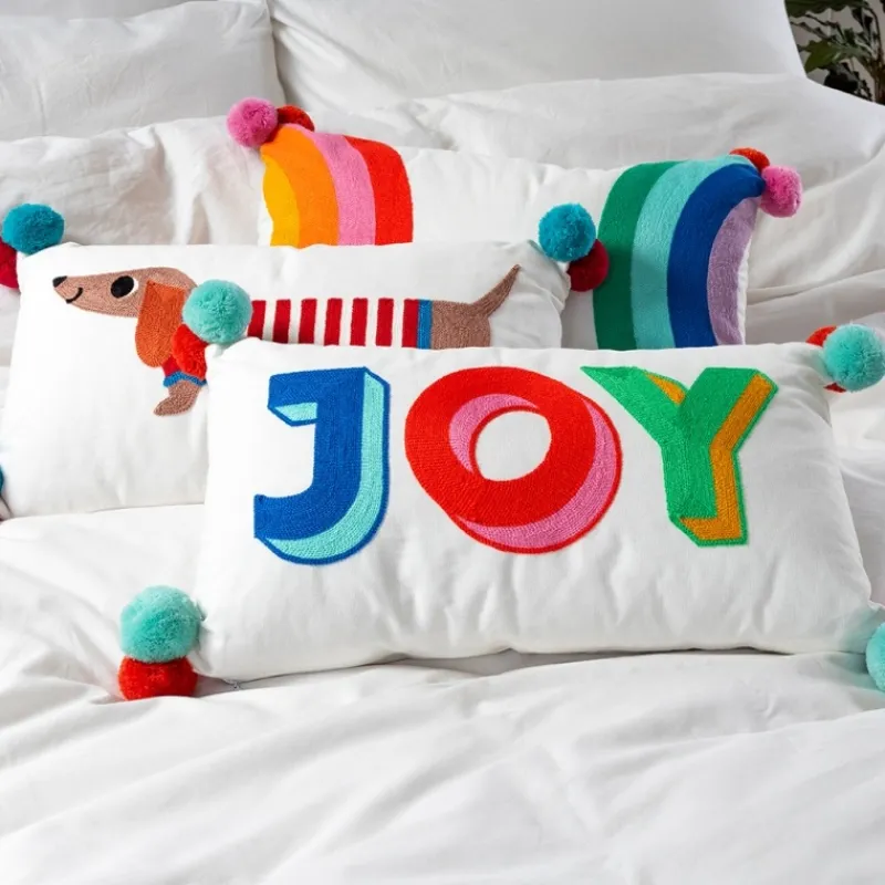 Rex London Embroidered cushion with pom poms - Joy Hot